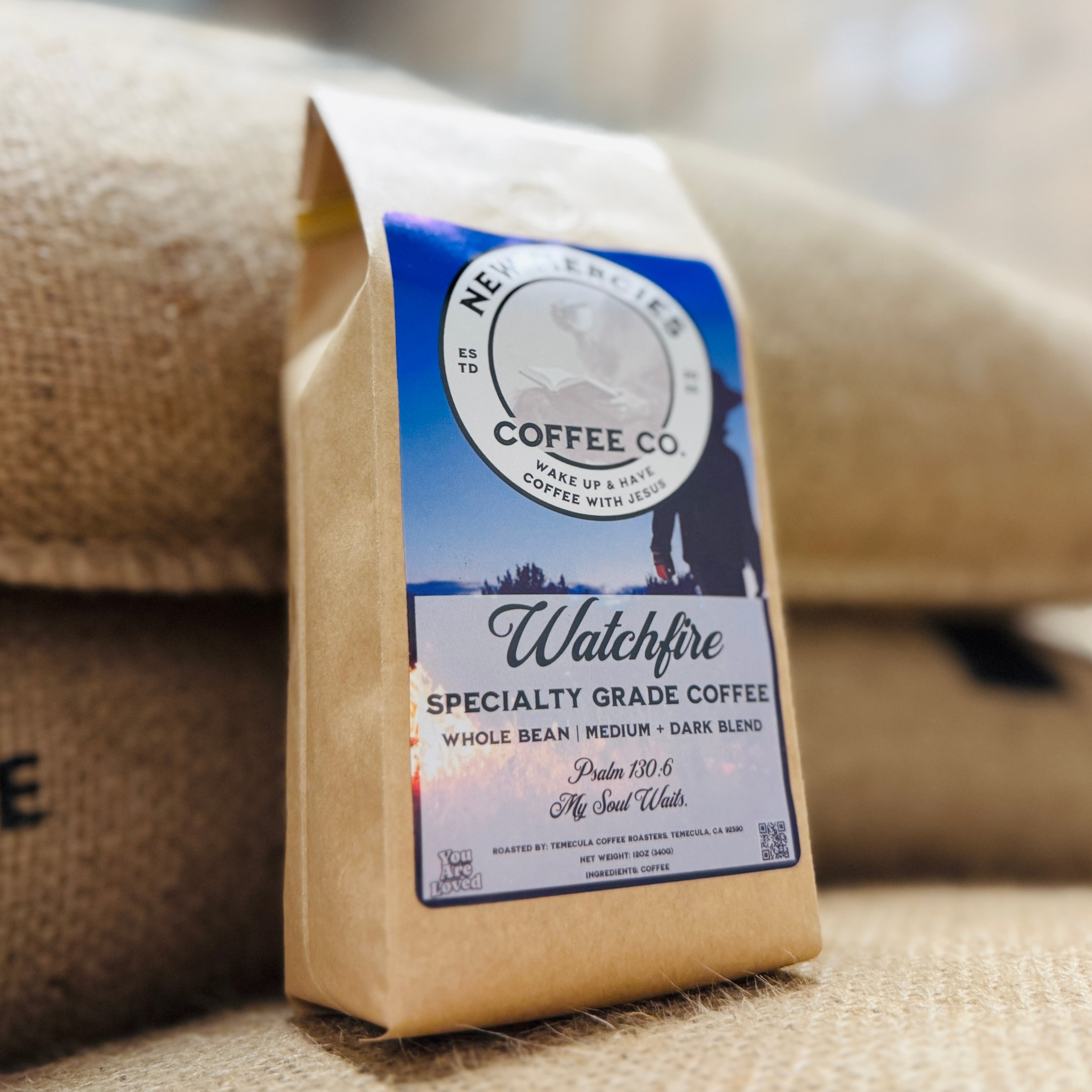Watchfire Specialty Grade Coffee bag on a textured surface